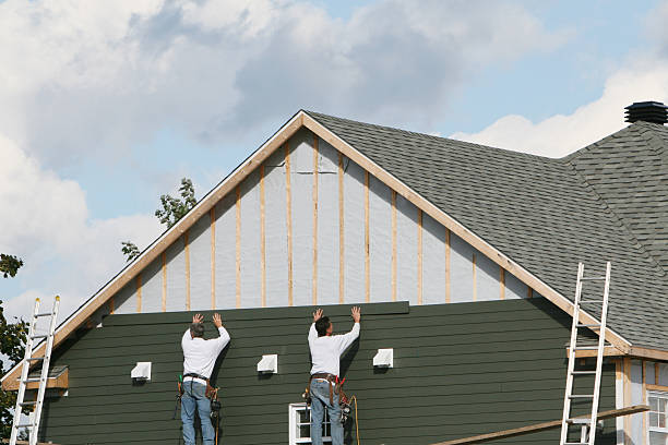 Professional Storm Damage Siding Repair technician working in Bakerstown, PA